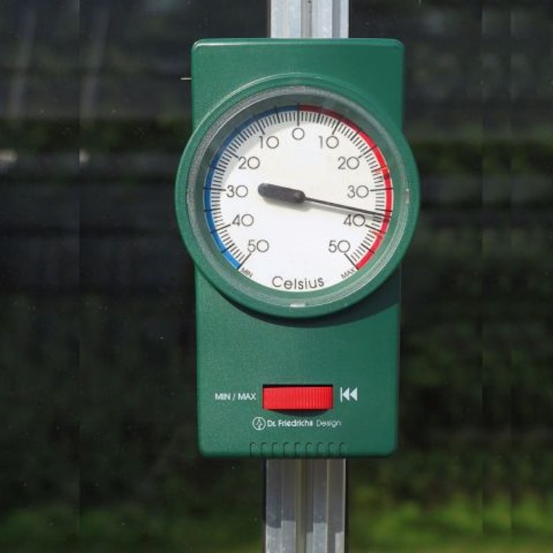 Vitavia max min thermometer in greenhouse for monitoring overnight winter temperatures