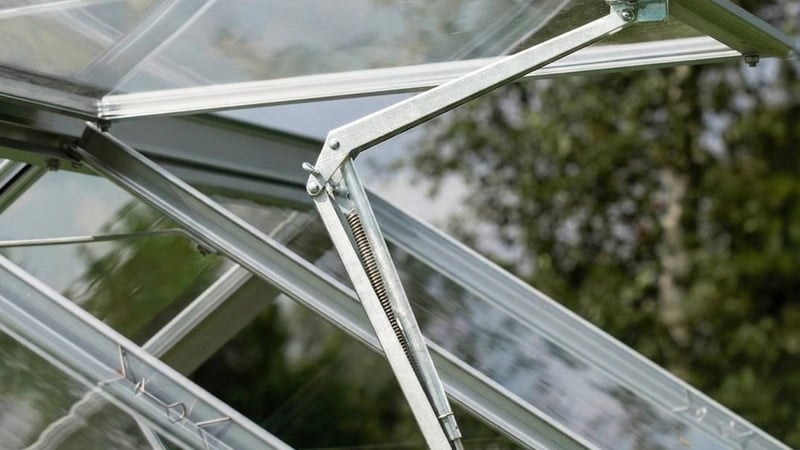 Close-up view of an automatic greenhouse vent