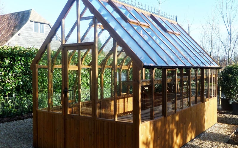 Swallow Eagle wooden greenhouse prepared for the spring growing season