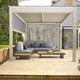 Nexus Beige Aluminium Pergola - Front Screen Down by House