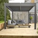 Nexus Grey Louvred Pergola - Rear Screen Down on Stone Patio